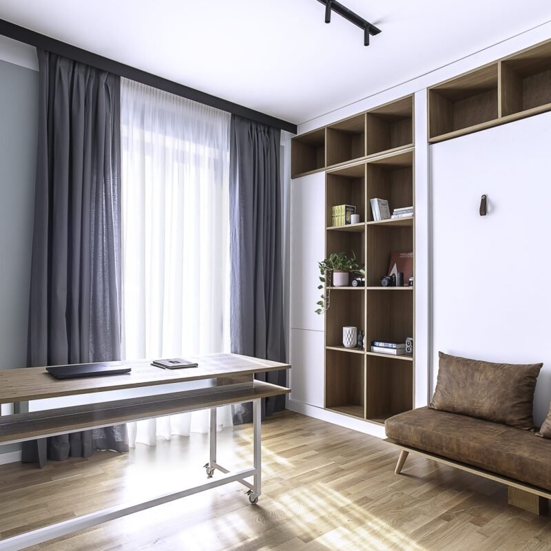 Birou multifunctional cu pat Murphy, oferind un spațiu compact și eficient, perfect pentru un apartament de lux.