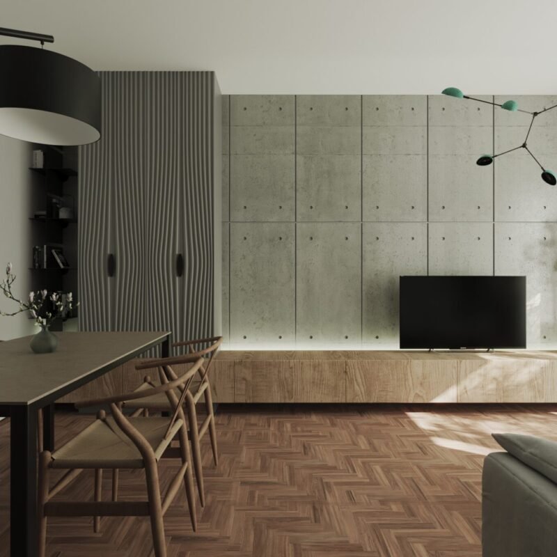 Living confortabil decorat în tonuri pământii, cu mobilier modern și accente decorative elegante.