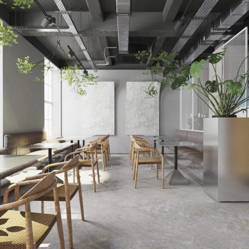 Mese din aluminiu și scaune metalice, combinate cu plante naturale, într-un restaurant din stil Scandinav și Japandi.