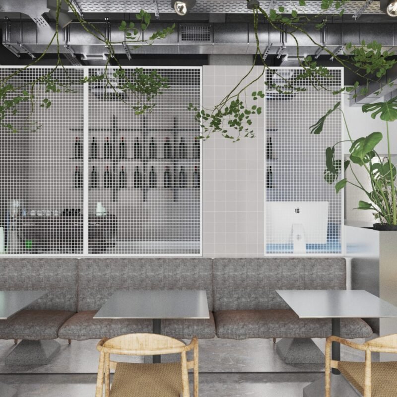 Iluminat cald și plante decorative integrate într-un restaurant cu design Scandinav din București.